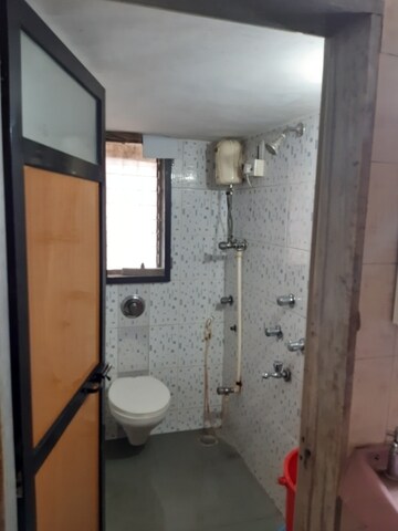 Bathroom in 1 BHK Apartment at Nilkanth Niwas, Naupada – for Rent