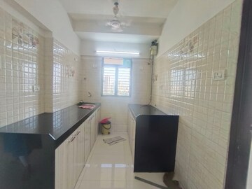 Kitchen in 1 BHK Apartment at Goregaon West View CHS, Goregaon West – for Rent