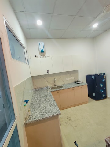Kitchen in 2 BHK Builder Floor at Ansal Sushant Lok I, Sector 43 – for Rent