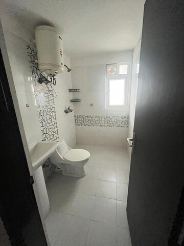 Bathroom in 3 BHK Apartment at Mahagun Mirabella, Sector 79 – for Rent
