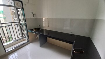 Kitchen in 2 BHK Apartment at Ashar Metro Towers, Vartak Nagar – for Sale