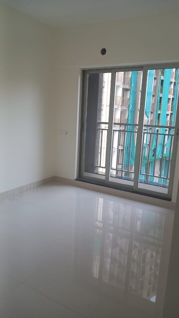 Room in 2 BHK Apartment at Ashar Metro Towers, Vartak Nagar – for Sale