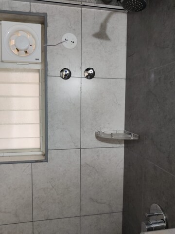 Bathroom in 3 BHK Apartment at Mahaveer Trident, Begur – for Rent