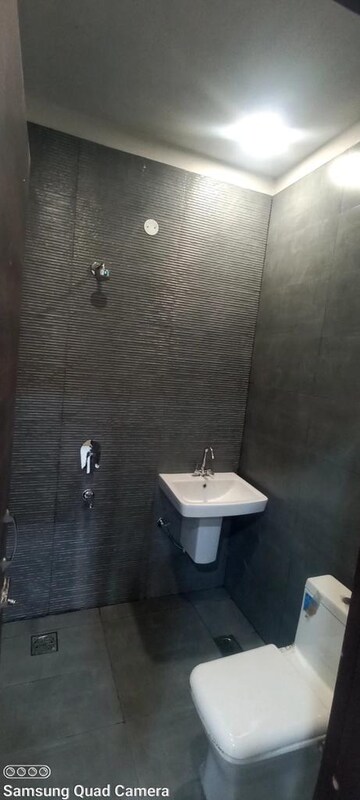 Bathroom in 3 BHK Apartment at Dhakoli Village – for Rent