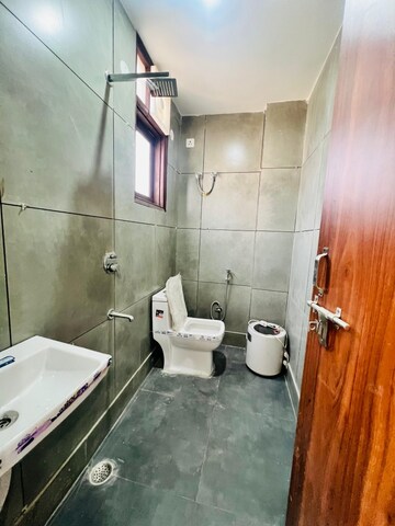 Bathroom in 2 BHK Builder Floor at Chattarpur – for Rent