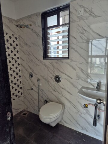 Bathroom in 1 BHK Apartment at UK Luxecity, Kandivali East – for Rent
