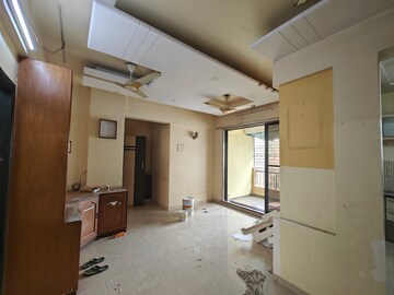 Living Room in 2.5 BHK Apartment at Nisarg CHS Nerul, Nerul – for Sale