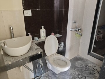 Bathroom in 3 BHK Apartment at Raunak Park, Kokanipada – for Rent