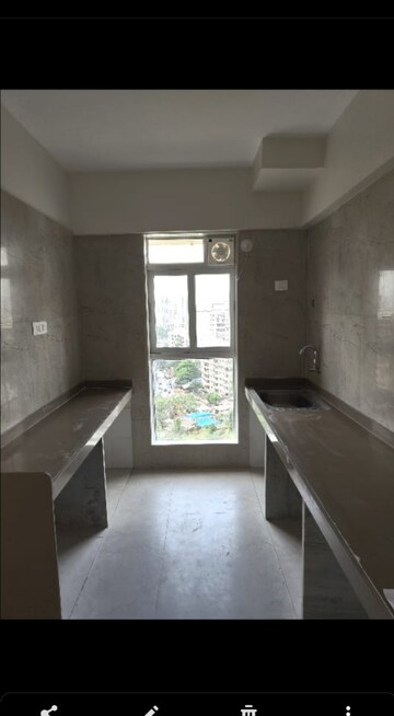 Kitchen in 2 BHK Apartment at Godrej Nest Kandivali, Kandivali East – for Rent