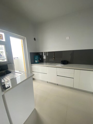 Kitchen in 3 BHK Apartment at Central Park Flower Valley Aqua Front Towers, Sohna Sector 33 – for Rent