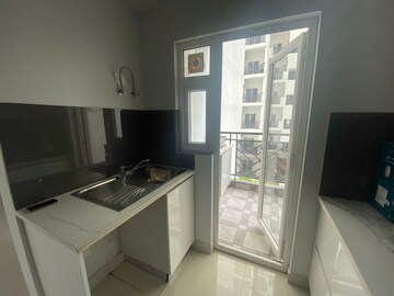 Kitchen in 3 BHK Apartment at Central Park Flower Valley Aqua Front Towers, Sohna Sector 33 – for Rent