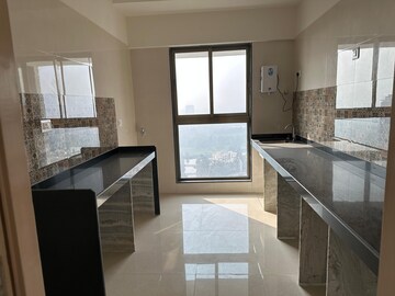 Kitchen in 3 BHK Apartment at Rajesh Raj Infinia, Malad West – for Sale