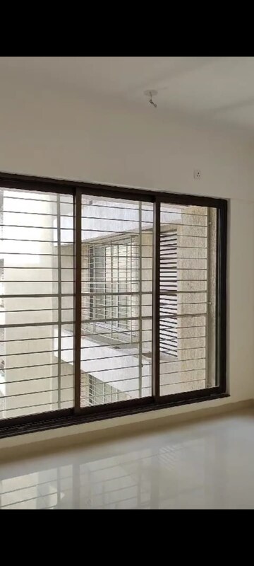 Room in 2 BHK Apartment at Acme Ozone, Manpada – for Sale