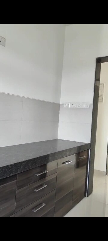 Kitchen in 2 BHK Apartment at Acme Ozone, Manpada – for Sale