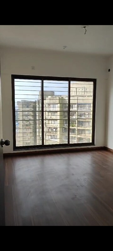 Room in 2 BHK Apartment at Acme Ozone, Manpada – for Sale