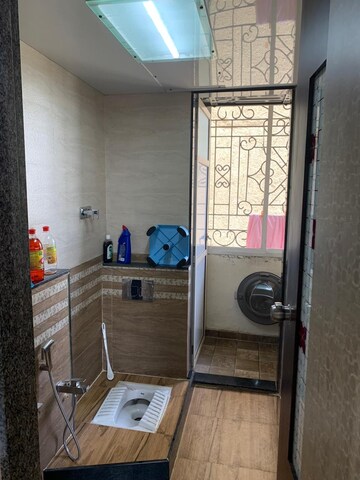 Bathroom in 2 BHK Apartment at Gala Pride Palms, Kolshet Road – for Sale