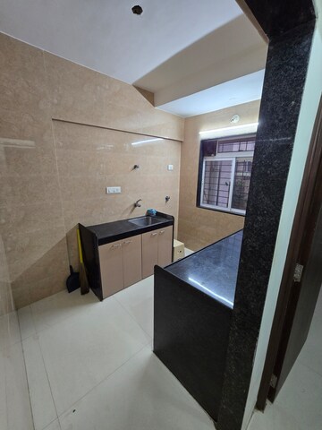 Kitchen in 2 BHK Apartment at Navkar Yellow Rose, Borivali West – for Sale