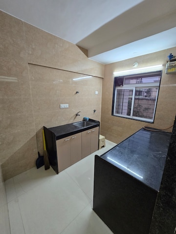 Kitchen in 2 BHK Apartment at Navkar Yellow Rose, Borivali West – for Sale