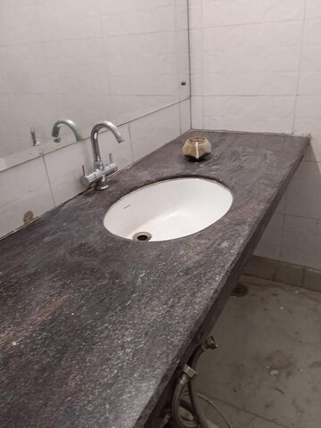 Bathroom in 3 BHK Apartment at Orchid Petals, Sector 49 – for Rent