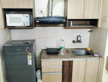 Kitchen in 1 RK Apartment at Supertech Ecociti, Sector 137 – for Rent