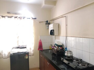 Kitchen in 1 BHK Apartment at Happy Valley, Manpada – for Sale