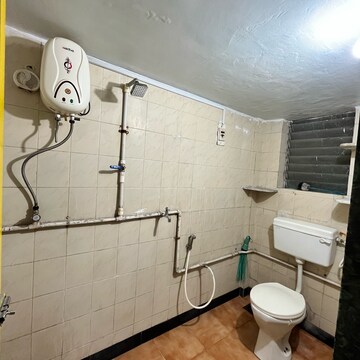 Bathroom in 1 BHK Apartment at Brahmand CHS, Brahmand – for Rent