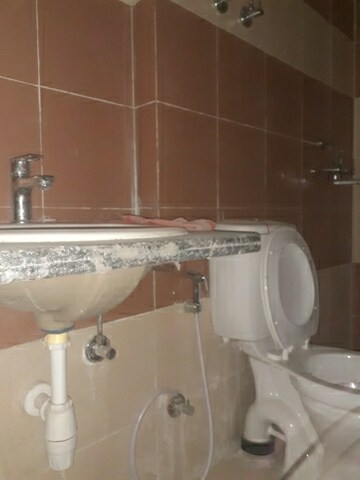 Bathroom in 3 BHK Apartment at Mahagun Mywoods, Sector 16c Greater Noida – for Rent