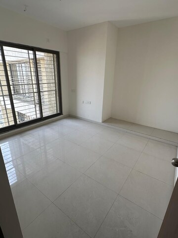 Room in 2 BHK Apartment at Acme Ozone, Manpada – for Sale