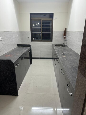 Kitchen in 2 BHK Apartment at Acme Ozone, Manpada – for Sale