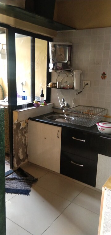 Kitchen in 2 BHK Apartment at Nava Naroda – for Sale