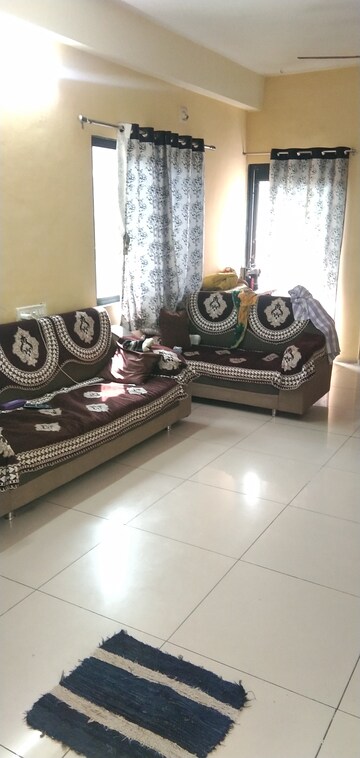 Living Room in 2 BHK Apartment at Nava Naroda – for Sale