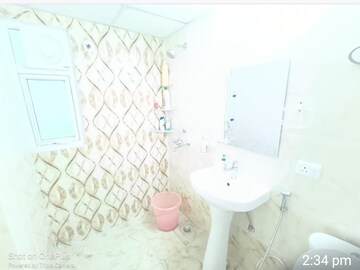 Bathroom in 2.5 BHK Apartment at Saviour Green Arch, Tech Zone 4 Greater Noida – for Rent