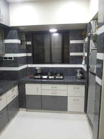 Kitchen in 2 BHK Apartment at Lok Upvan I, Manpada – for Sale