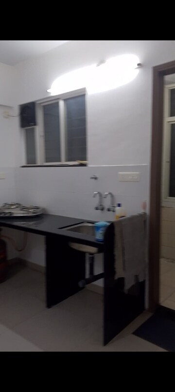 Kitchen in 2 BHK Builder Floor at Purava Srushti Apartment, Nanded – for Sale
