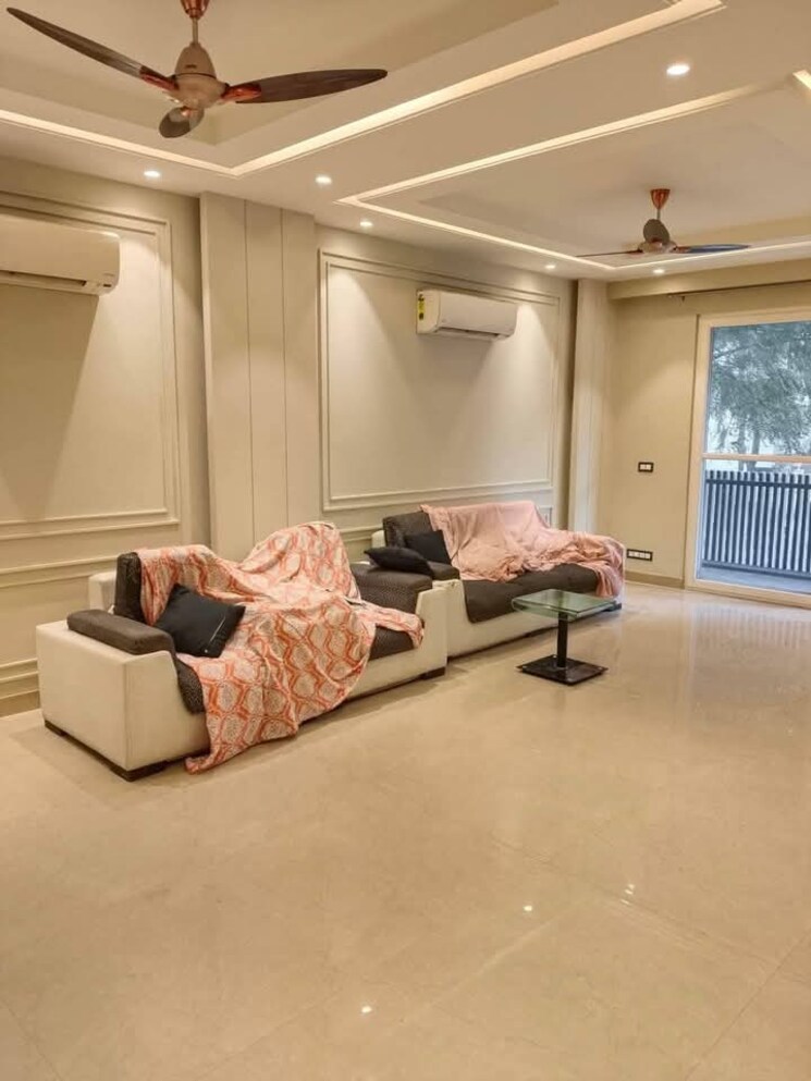 Living Room, ansal-api-versalia 4 Bedroom 1818 Sq.Ft. Apartment In Sector 67a Gurgaon 8094448