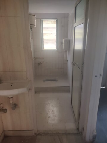 Bathroom in 2 BHK Apartment at Lok Upvan I, Manpada – for Sale