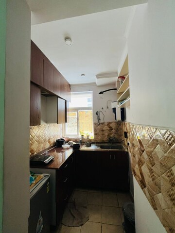 Kitchen in 2 BHK Apartment at Sector 16b Greater Noida – for Rent