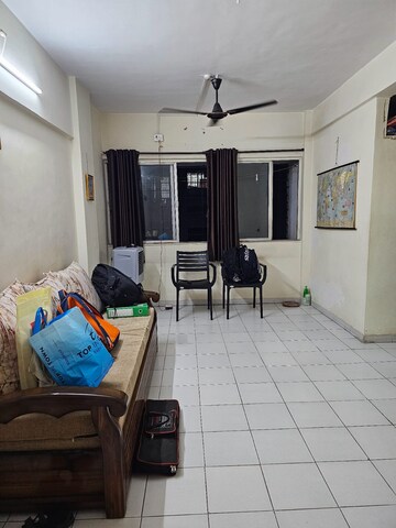 Team Area in 1 BHK Apartment at Alguj CHS, Vasant Vihar – for Sale