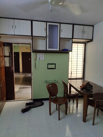 Living Room in 1 BHK Apartment at Lokpuram CHS, Vasant Vihar – for Sale