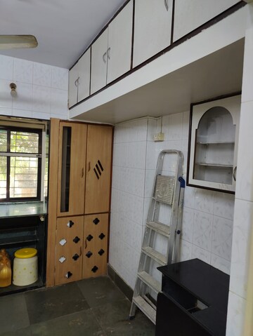 Living Room in 1 BHK Apartment at Lokpuram CHS, Vasant Vihar – for Sale
