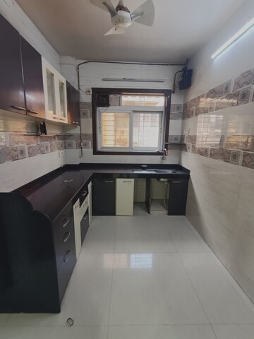 Kitchen in 3 BHK Apartment at Banjara CHS, Kharghar – for Rent