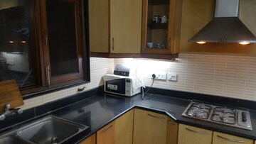 Kitchen in 2 BHK Builder Floor at New Friends Colony – for Rent