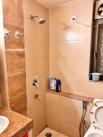 Bathroom in 2 BHK Apartment at Unitech Uniworld Gardens 2, Sector 47 – for Rent
