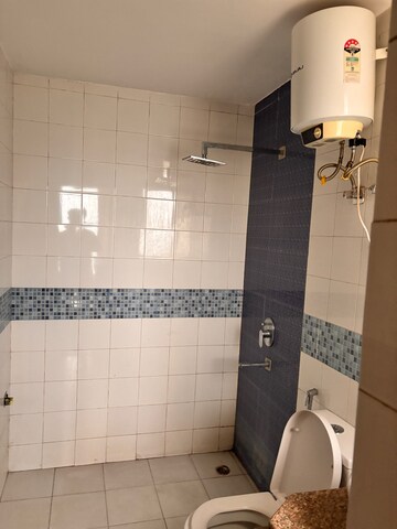 Bathroom in 3 BHK Apartment at Unitech Uniworld Gardens 2, Sector 47 – for Rent