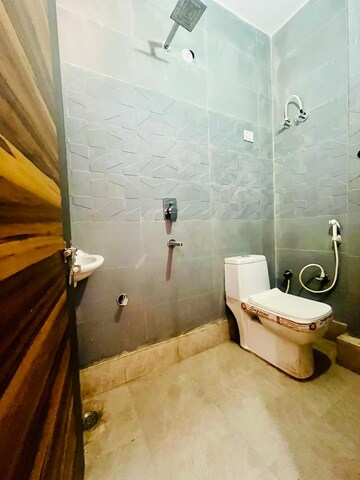 Bathroom in 3 BHK Builder Floor at Dwarka Mor – for Rent