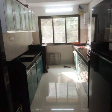 Kitchen in 2 BHK Apartment at Girnar Accord CHS, Nalasopara East – for Sale