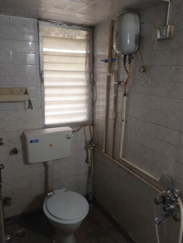 Bathroom in 2 BHK Apartment at Panchvan Complex, Borivali West – for Rent