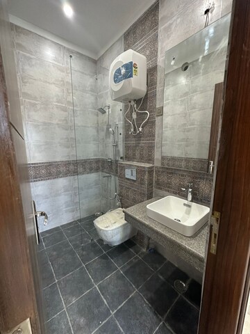 Bathroom in 2 BHK Apartment at Windsor Paradise 2, Raj Nagar Extension – for Sale