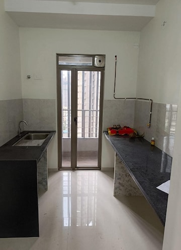 Kitchen in 2 BHK Apartment at Kalpataru Paramount, Kapur Bawdi – for Rent