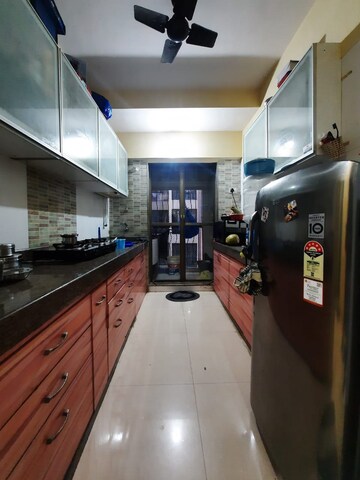 Kitchen in 2 BHK Apartment at Gaurav Woods Phase I, Mira Road – for Rent
